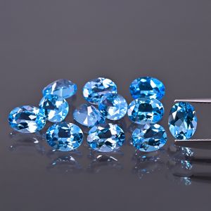 Ovaler Stein, Kegel - Swiss Blue Topas 7x5 MM